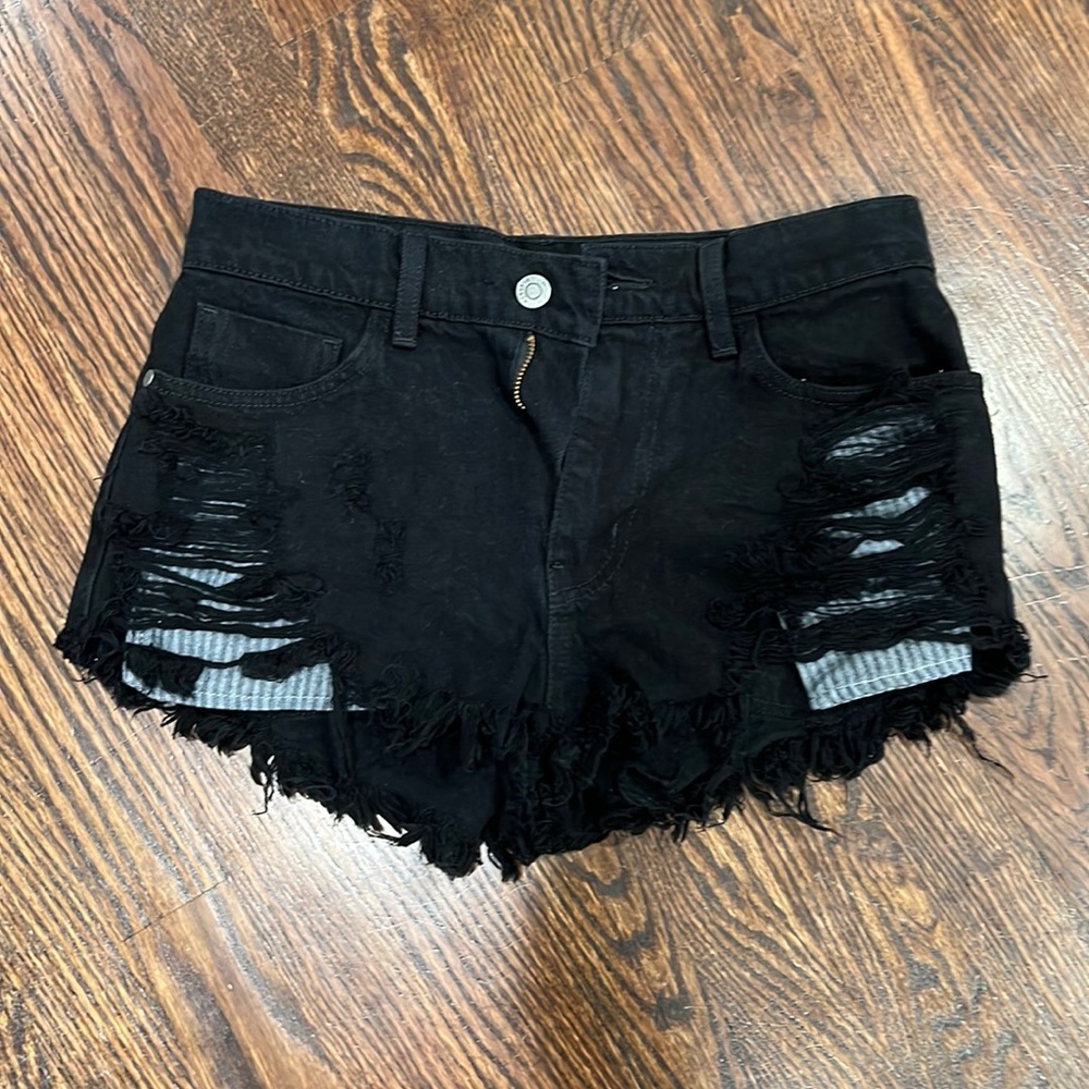 Distressed black shorts